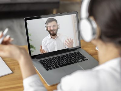 close-up-woman-videocalling-employee